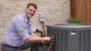 HVAC Technician working on an AC Unit