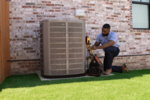 Technician Working on HVAC Unit