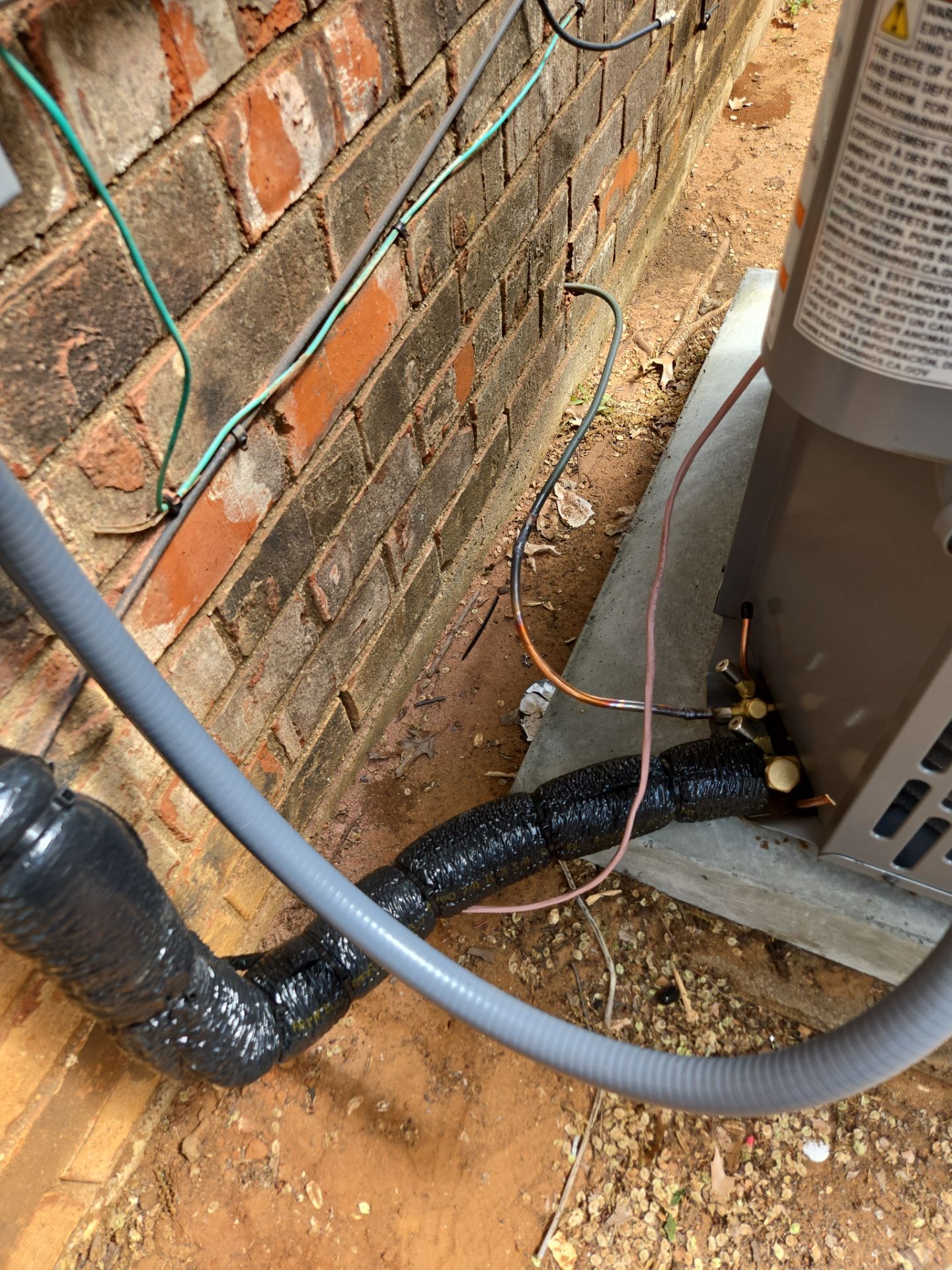 New refrigerant line set connected to a new American Standard condenser in Arlington, TX