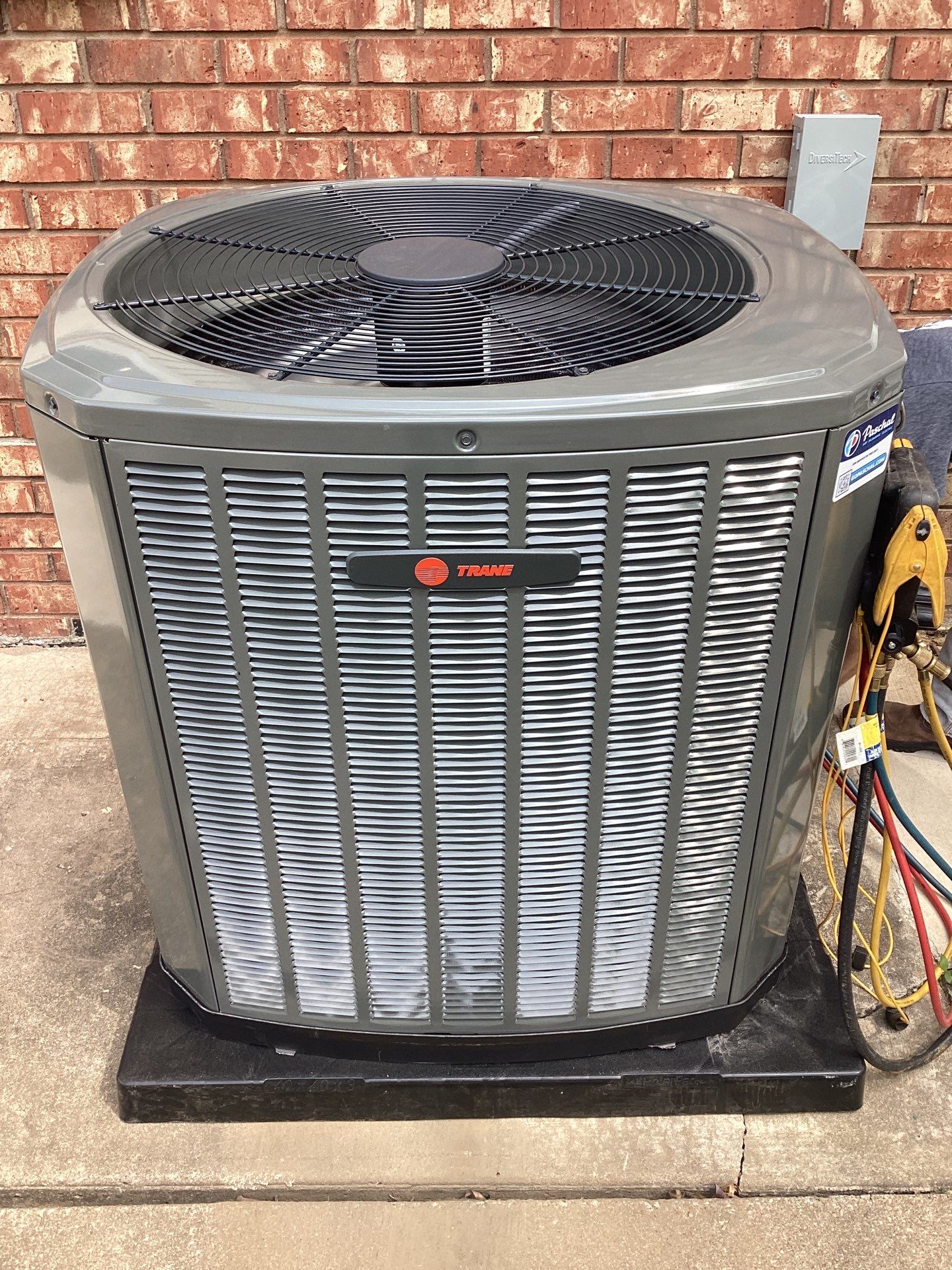 New Trane outdoor AC condenser installed by Paschal in Broken Arrow, OK