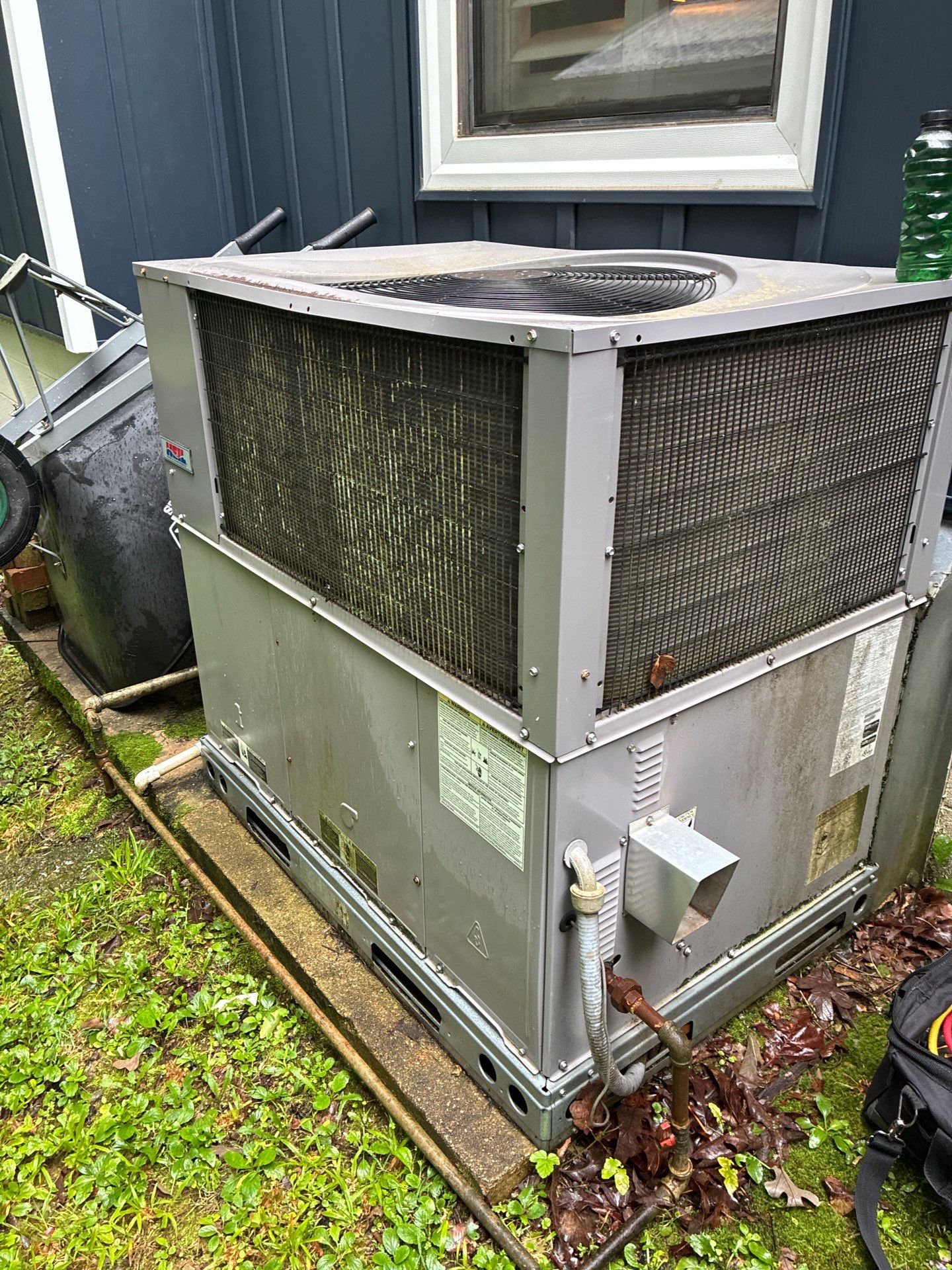 Older packaged HVAC unit at a Hot Springs, AR home serviced by Paschal technician Caleb