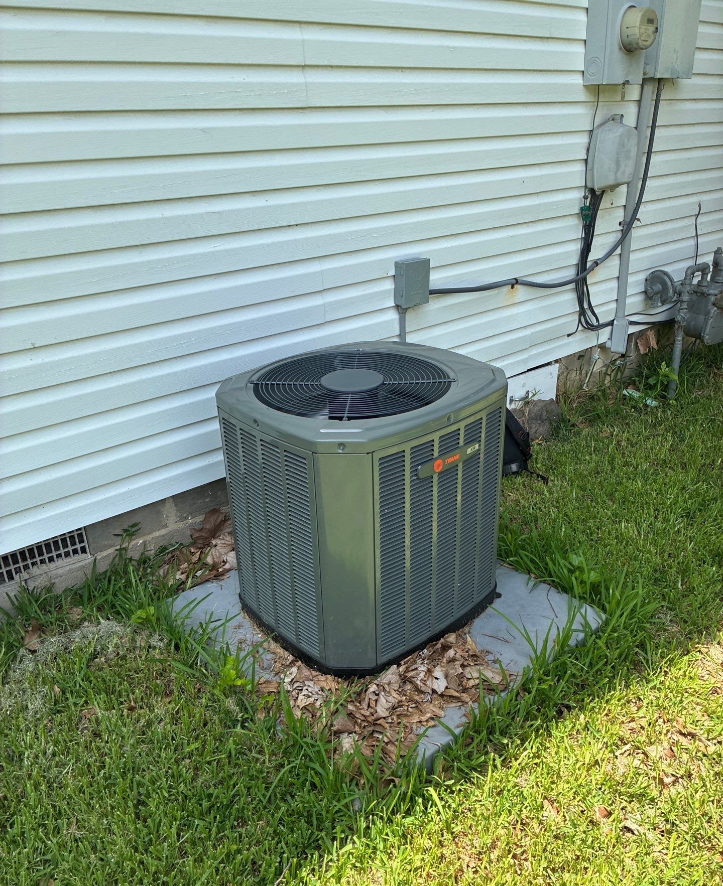 Trane outdoor AC unit at a Searcy, AR home maintained by Paschal technician Travis