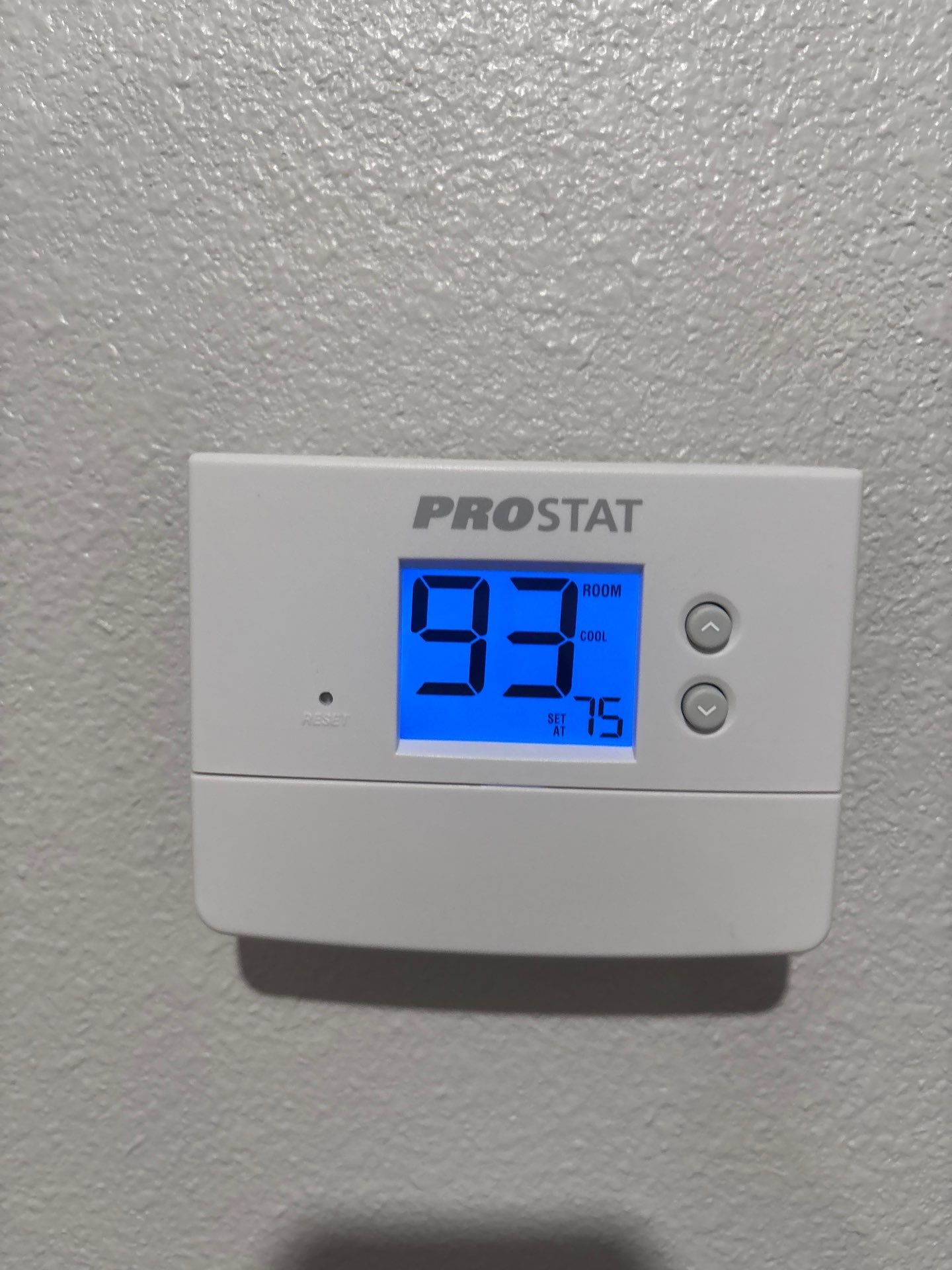 Home thermostat reading 93 degrees during a heat wave